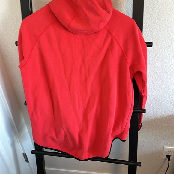 Bright red, hi/low zip up with hood. Zipper is off to the side. - Picture 3 of 3